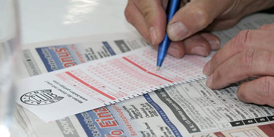 Punter placing a horse racing bet